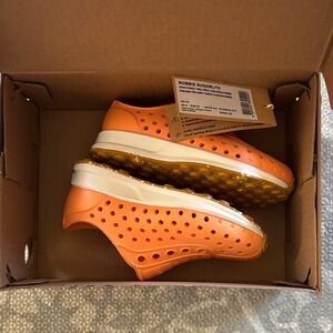 Native toddler Shoes in Orange and White size 5